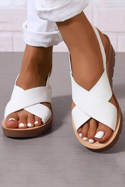 sandali con zeppa, cinturino incrociato, slingback e fibbia, punta aperta.