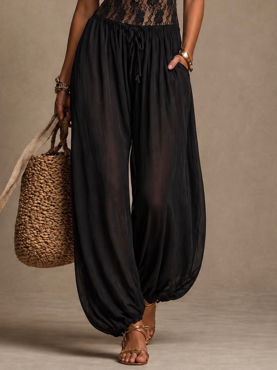 LIRA | Tuta con scollo all’americana in pizzo fluido