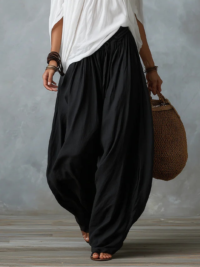 Completo Bianco con Top a Spalle Scoperte e Pantaloni a Lanterna Ampi