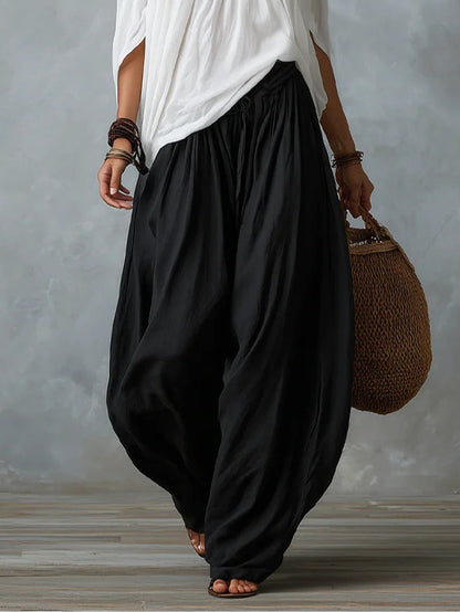 Completo Bianco con Top a Spalle Scoperte e Pantaloni a Lanterna Ampi