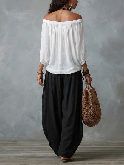 Completo Bianco con Top a Spalle Scoperte e Pantaloni a Lanterna Ampi