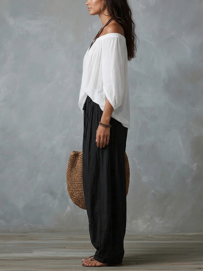 Completo Bianco con Top a Spalle Scoperte e Pantaloni a Lanterna Ampi