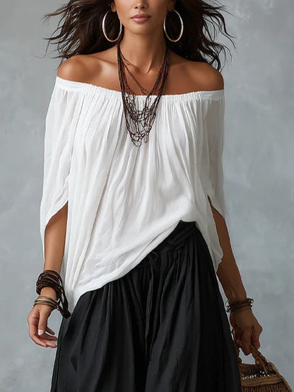 Completo Bianco con Top a Spalle Scoperte e Pantaloni a Lanterna Ampi
