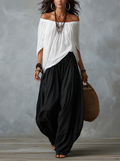 Completo Bianco con Top a Spalle Scoperte e Pantaloni a Lanterna Ampi